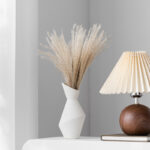 white ceramic round vase