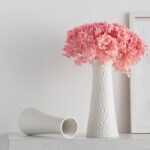 white porcelain vase red flowers